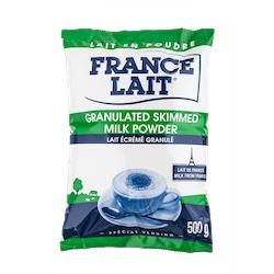"Close-up of a 500g bag of France Lait freeze-dried milk granules, featuring the brand logo and product details on the packaging."