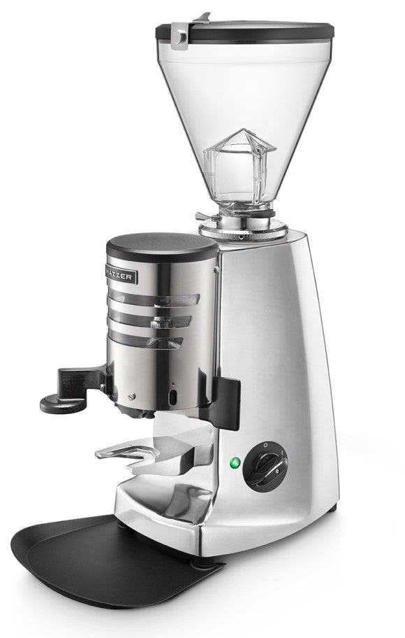 "Close-up image of the Mazzer Super Jolly V Up Manual Coffee Grinder, featuring a sleek design with stainless steel construction, a large hopper for coffee beans, and a manual grinding switch. The grinder is ready to deliver precision and control for coffee enthusiasts."